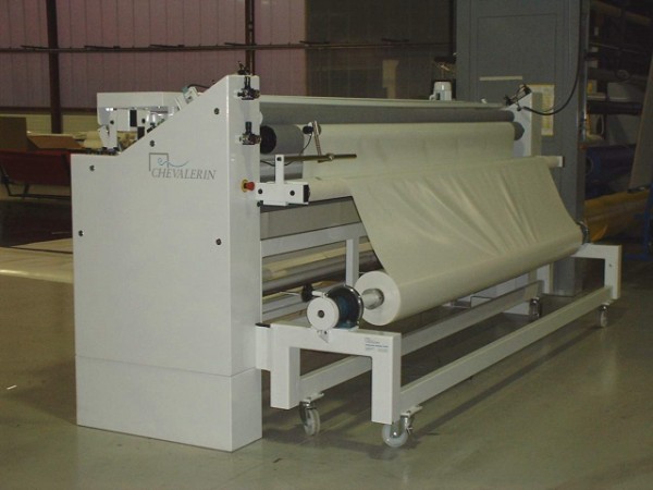 Cutting machine for coated fabrics