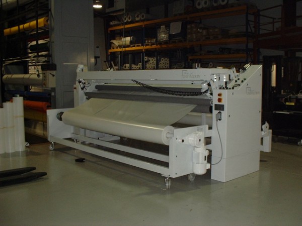 Cutting machine for coated fabrics