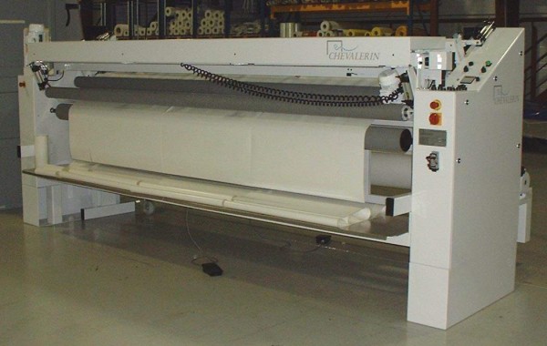 Cutting machine for coated fabrics