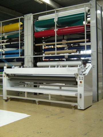 Cutting machine for coated fabrics