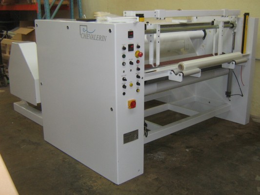 Rolling machine for fiber glass fabrics