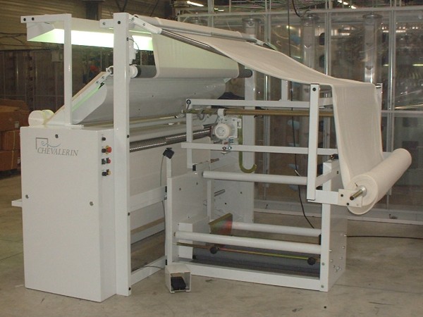 Inspection machine with opening system