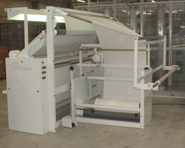 Inspection machine with opening system