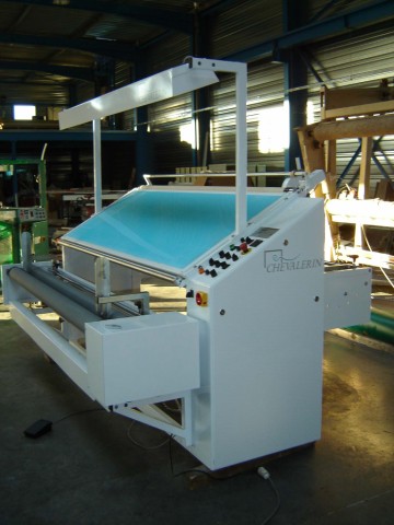 Inspection machine for elastic fabrics