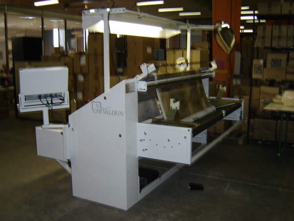 Inspection machine for elastic fabrics