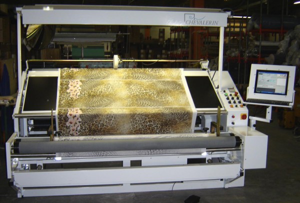 Inspection machine for elastic fabrics