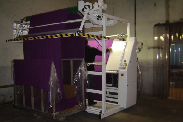 Inspection machine with output folding système