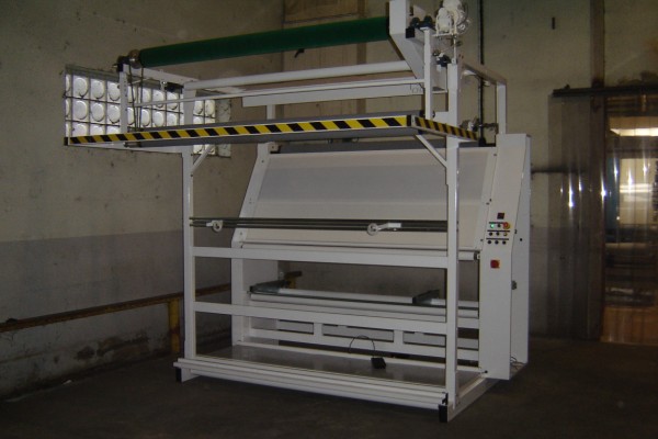 Inspection machine with output folding système