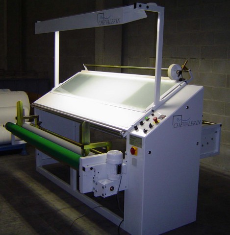 Inspection machine for non elastic fabric