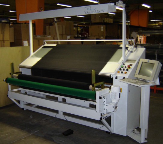 Inspection machine for elastic fabrics