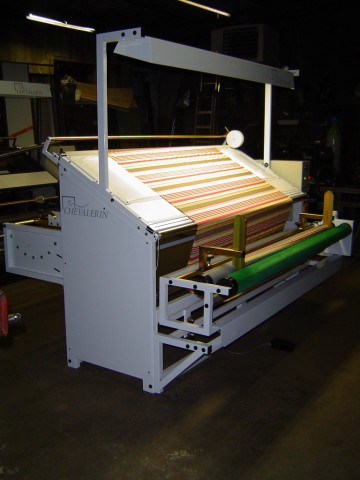 Inspection machine for non elastic fabric